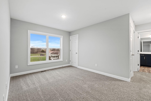 view of carpeted spare room