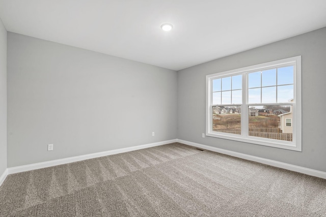 view of carpeted spare room