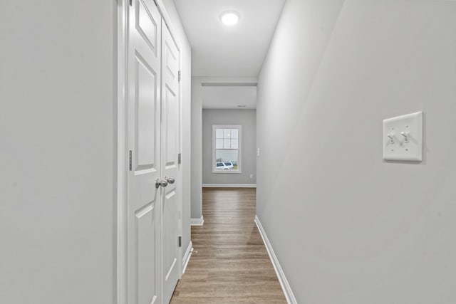 hallway featuring light wood-type flooring