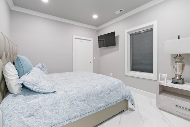 bedroom with ornamental molding