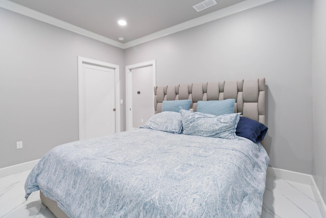 bedroom featuring crown molding