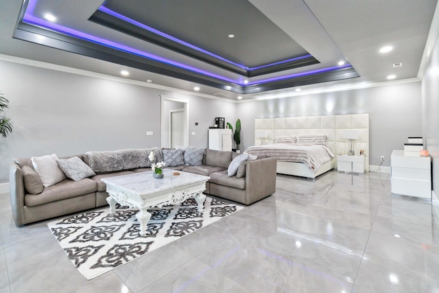 bedroom featuring a raised ceiling and crown molding