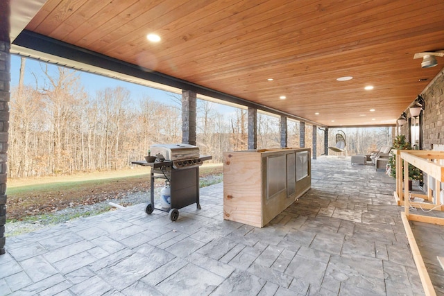 view of patio featuring grilling area and an outdoor kitchen