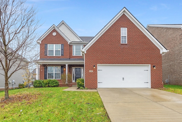 view of front of house with a front lawn and a garage