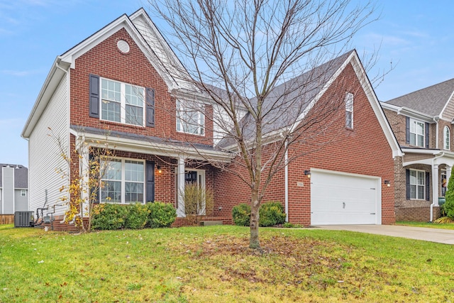 view of front of house with central AC unit, a garage, and a front lawn