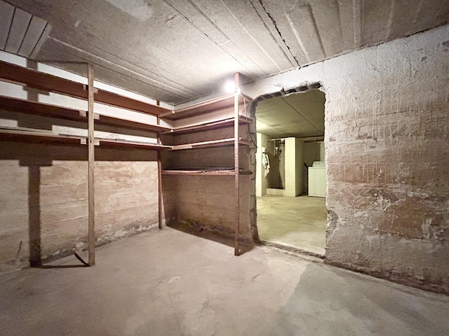 basement with washer / clothes dryer