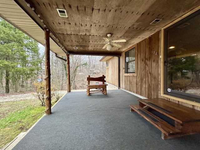 view of patio featuring ceiling fan