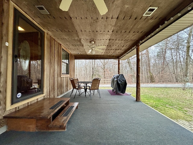 view of patio with grilling area and ceiling fan