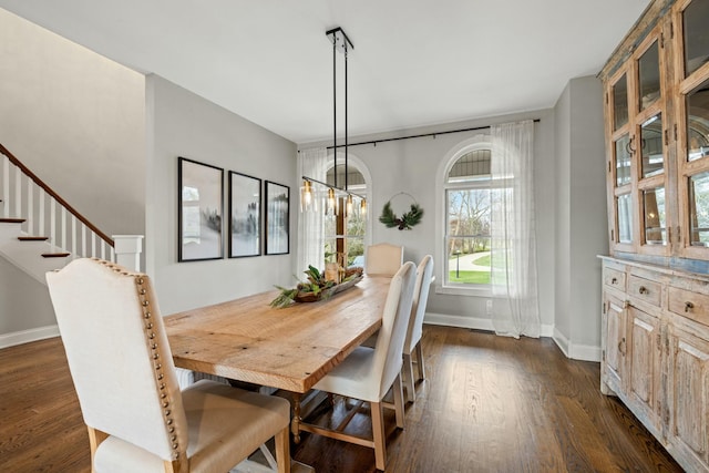 dining room with dark wood-type flooring