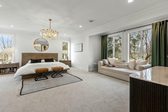 carpeted bedroom with multiple windows, crown molding, and an inviting chandelier