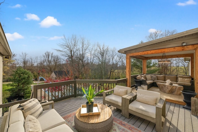 wooden deck with an outdoor hangout area