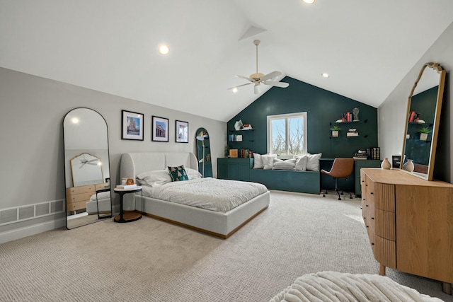 carpeted bedroom with ceiling fan and lofted ceiling