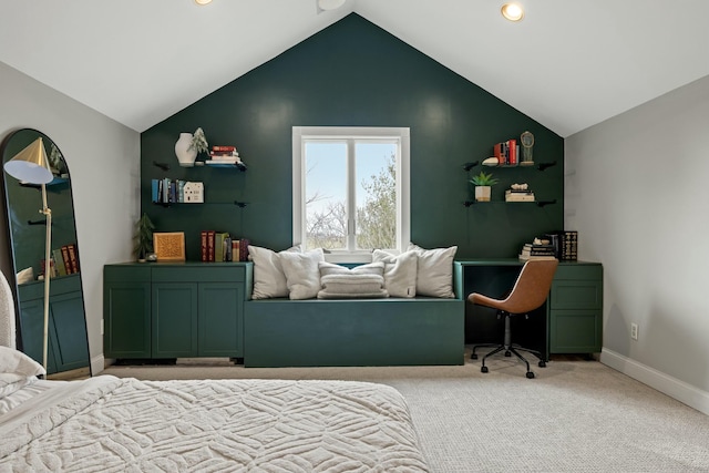 carpeted bedroom with vaulted ceiling