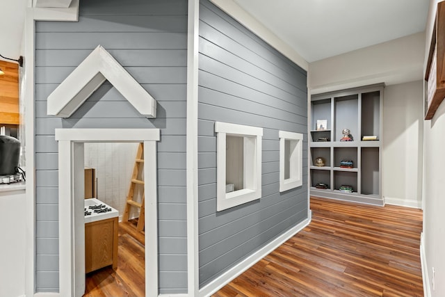 hallway featuring wood-type flooring