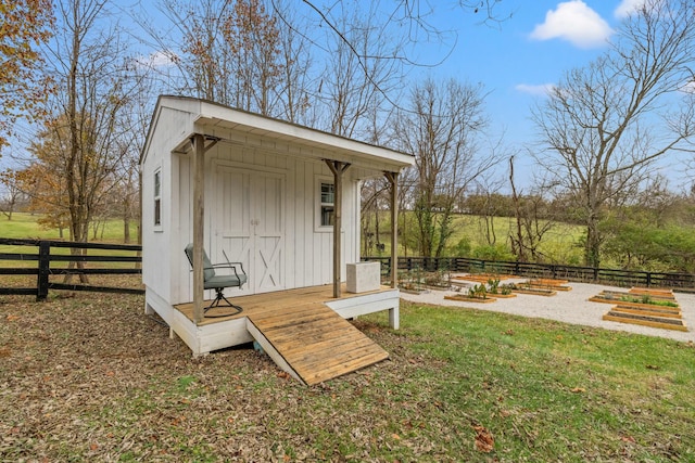 view of outdoor structure with a yard