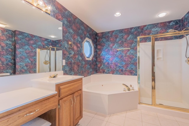 bathroom featuring tile patterned floors, vanity, and independent shower and bath