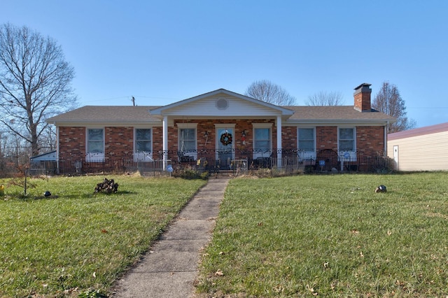 ranch-style house with a front lawn