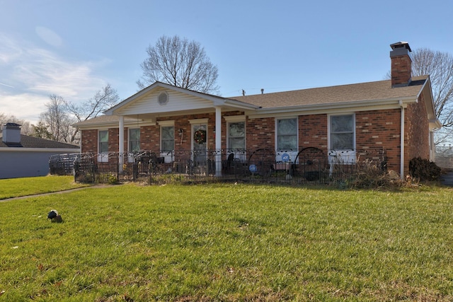 ranch-style home with a porch and a front lawn