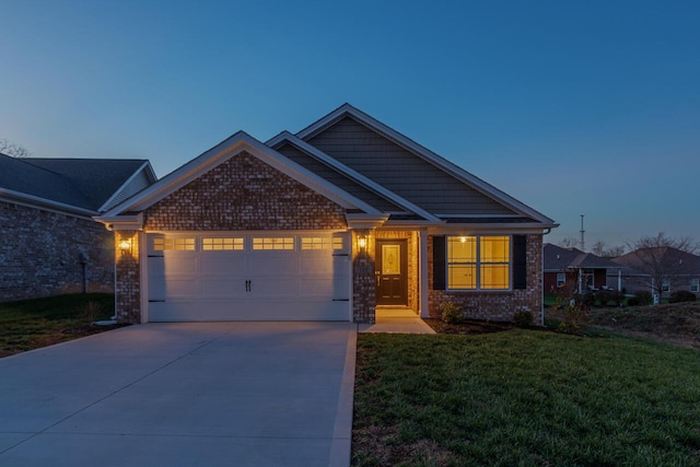 craftsman-style home with a lawn and a garage