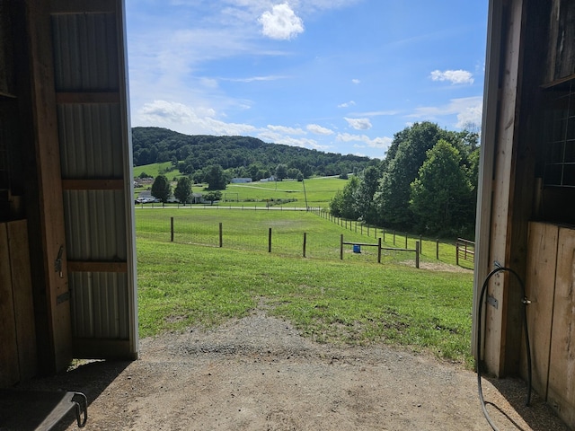 exterior space featuring a mountain view and a rural view