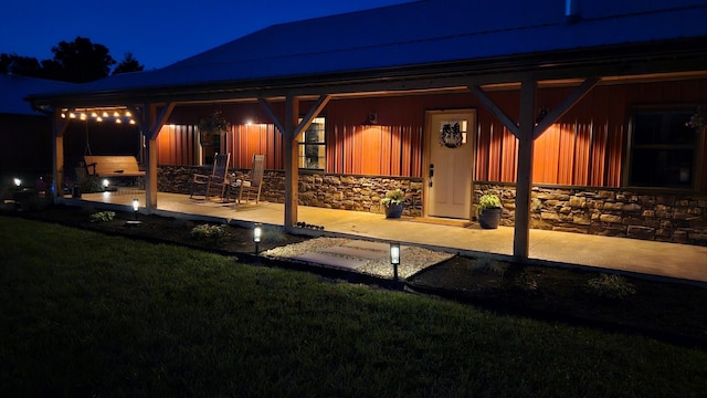 patio at twilight with a yard