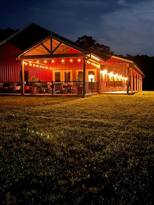 view of back house at night