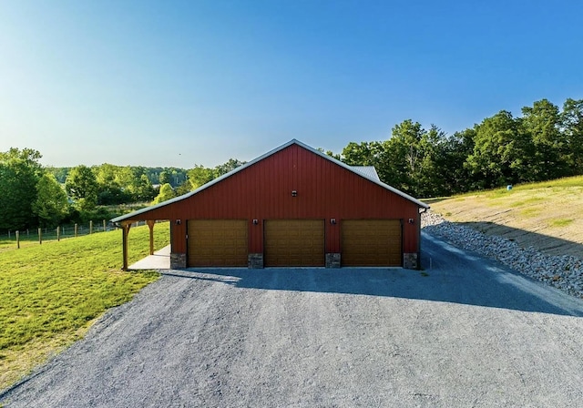 exterior space featuring an outdoor structure and a garage