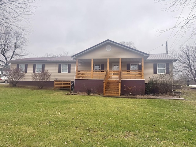 view of front of house featuring covered porch and a front lawn