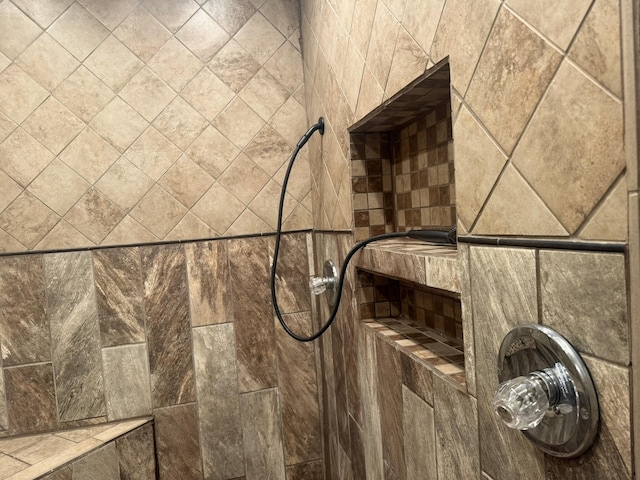 room details with a tile shower