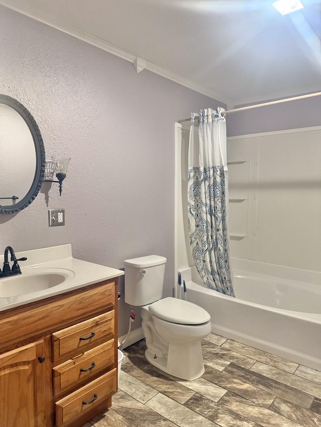 full bathroom featuring vanity, shower / tub combo, and toilet