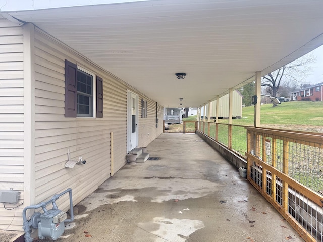 view of patio / terrace featuring a carport