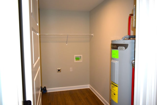 laundry room featuring hookup for an electric dryer, dark hardwood / wood-style flooring, electric water heater, and washer hookup