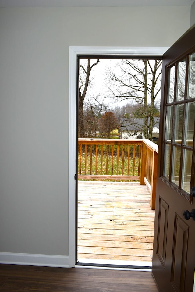 doorway to outside with dark hardwood / wood-style flooring