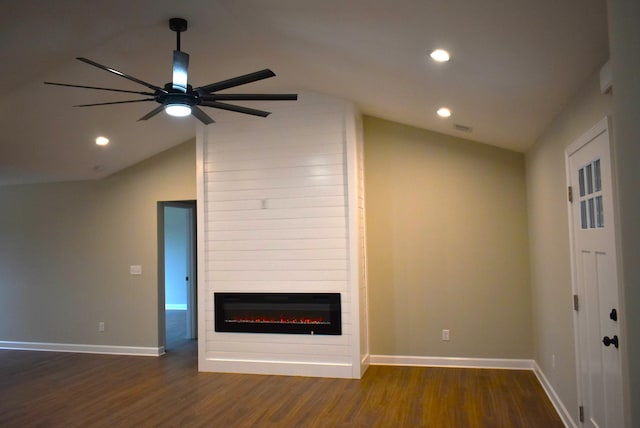 unfurnished living room with ceiling fan, a fireplace, dark wood-type flooring, and lofted ceiling