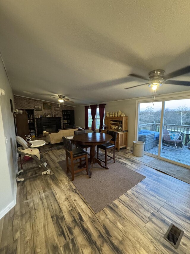 kitchen with lofted ceiling, black appliances, sink, light wood-type flooring, and separate washer and dryer