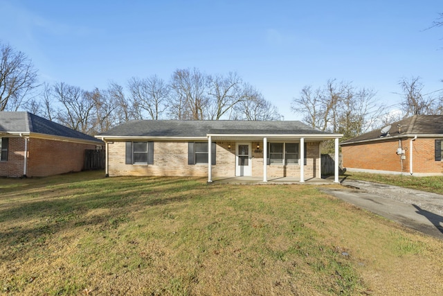 single story home featuring a front lawn and covered porch