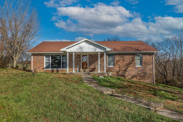 ranch-style house with a front yard