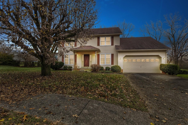 view of front of home with a garage