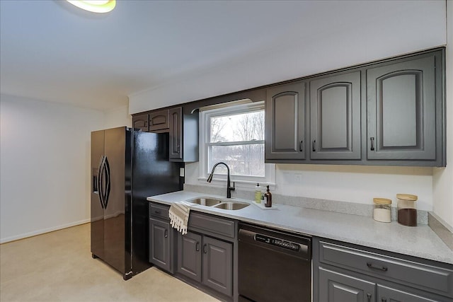 kitchen with sink and black appliances