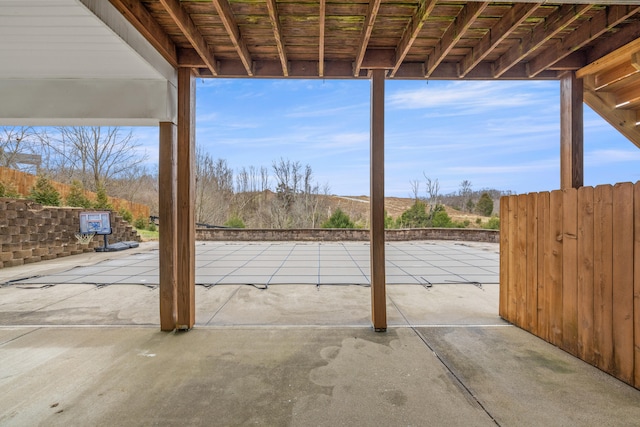 view of patio / terrace featuring fence