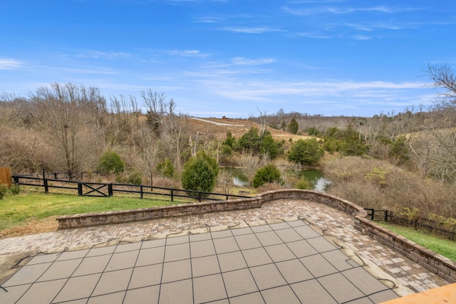 view of patio / terrace featuring a water view