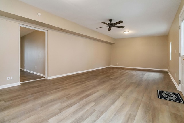 unfurnished room featuring ceiling fan and wood-type flooring