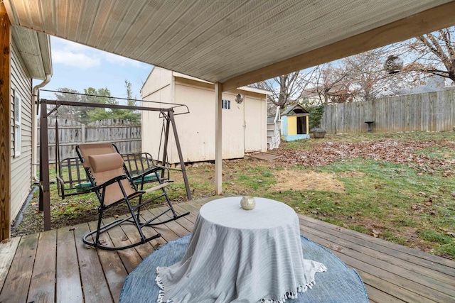 deck featuring a storage shed