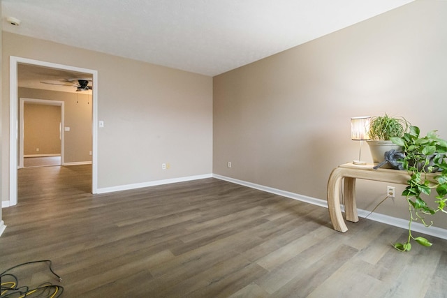 spare room with hardwood / wood-style floors