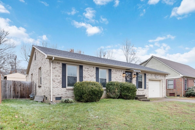 single story home with a garage and a front yard