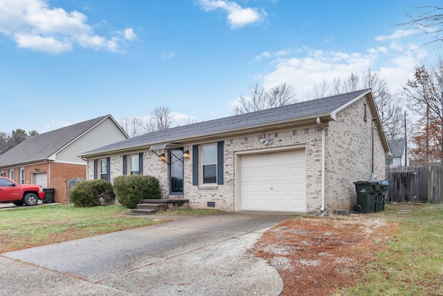 ranch-style house featuring a garage and a front yard