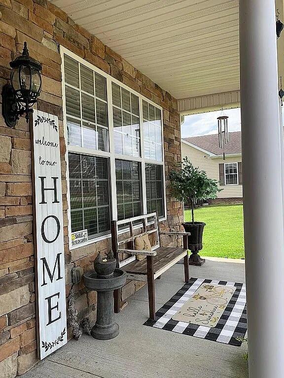 view of patio featuring a porch