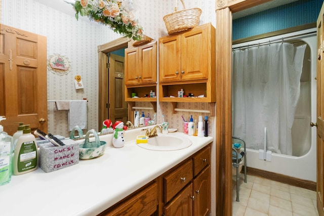 bathroom featuring shower / bath combo, vanity, and tile patterned floors