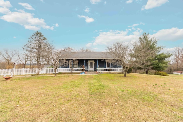 view of front of house with a porch and a front yard