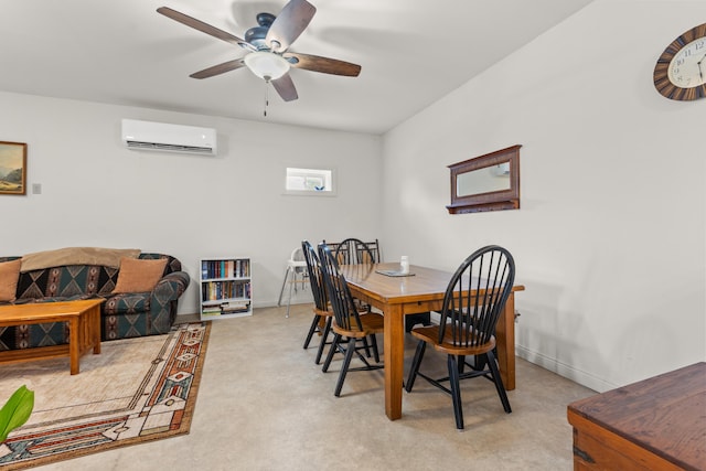 dining area featuring an AC wall unit, ceiling fan, and light carpet